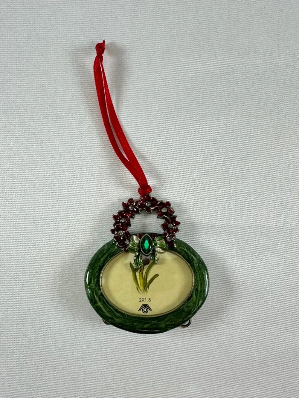 Enamel Red Poinsettia Wreath Christmas Ornament With Green Stone on Bow Frame